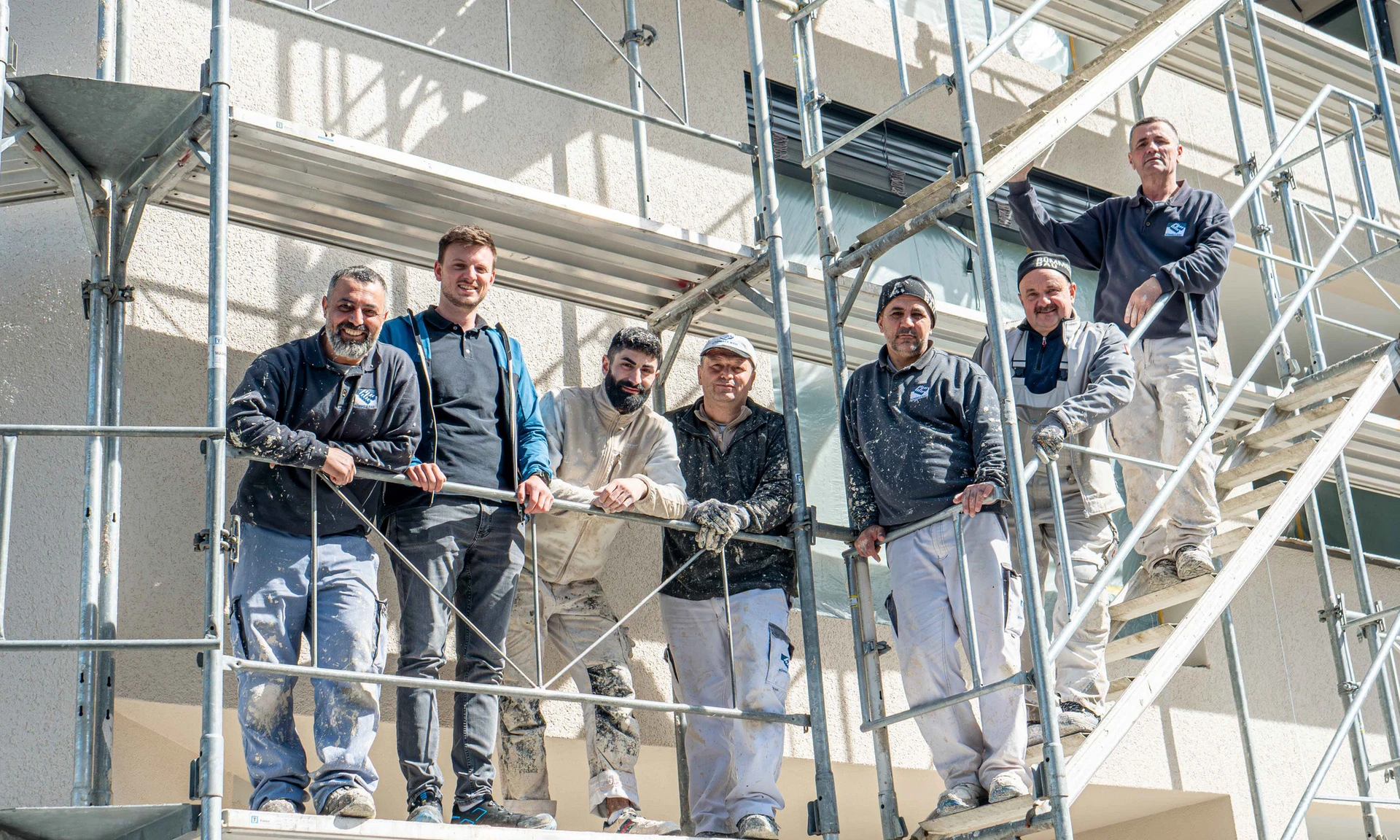 Teamfoto von Verputzer bei Wilhelm+Mayer Bau