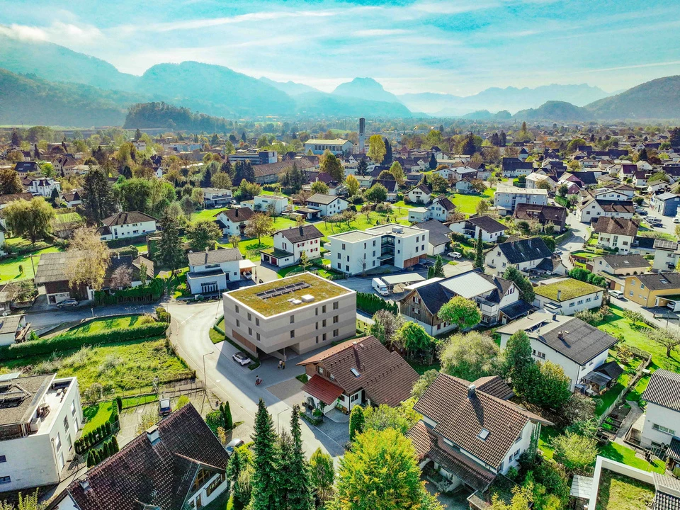 Visualisierung Luftbild eines geplanten Wohnprojekts von Wilhelm+Mayer in Altach in Vorarlberg.